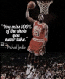 michael jordan is jumping in the air with a basketball .