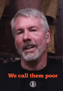 a man with a beard wearing a black shirt that says " we call them poor "