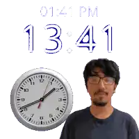 a man wearing glasses stands in front of a clock that reads 1341