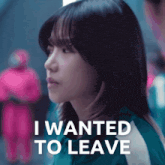 a woman in a green jacket with the words i wanted to leave on the bottom