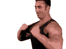 a man in a black tank top is flexing his muscles on a white background