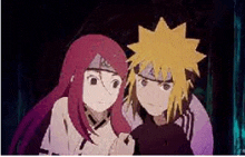 a couple of anime characters are standing next to each other in a dark room .