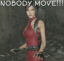 a woman in a red dress is standing in a dark room with the words `` nobody move '' written on the bottom .