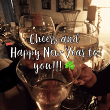 a cheers and happy new year to you greeting with three glasses of champagne