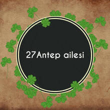 a black circle with the words 27 antep ailesi surrounded by clovers