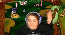 a woman wearing headphones and a shirt that says ' nintendo ' on the front