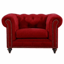 a red chair with studs on the arm rests and legs