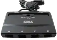a black sega controller with a cord attached
