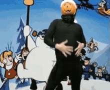 a man with a pumpkin on his head is dancing in front of a snowman