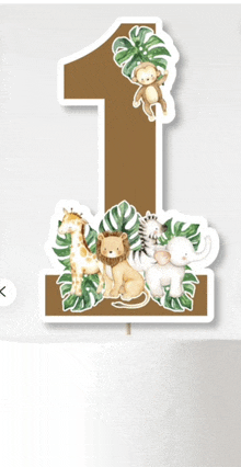 a cake topper with the number 1 and jungle animals