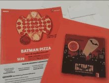 a batman pizza is being advertised in a magazine