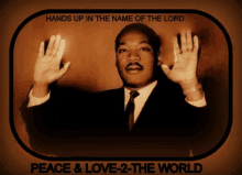 a picture of martin luther king jr. with the words hands up in the name of the lord