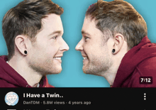 a video titled i have a twin shows two men smiling at each other