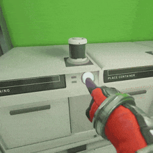 a hand is pointing at a place container in a video game