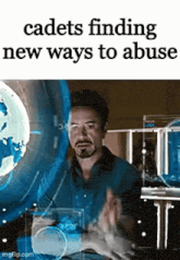 a man with a beard is sitting in front of a computer screen with the words cadets finding new ways to abuse .