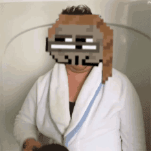 a pixelated image of a woman in a bathrobe with a mask on her face