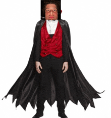 a person in a vampire costume with a picture of a man on their face