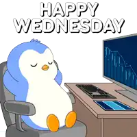 a penguin is sitting in front of a computer and the words happy wednesday are above it