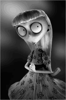 a black and white photo of a cartoon character with big eyes