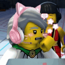 a lego character wearing a pair of pink cat ears headphones and a microphone .
