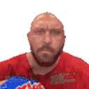 a bald man with a beard is wearing a red shirt and holding a bag of chips .