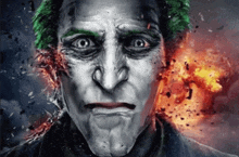 a close up of the face of the joker