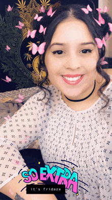 a woman is smiling in front of a tapestry with butterflies and the words so extra it 's fridaze