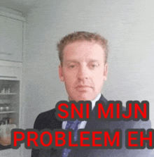 a man in a suit and tie with the words sni mijn probleem eh written in red