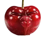 a cherry with a cartoon face on it making a kissing face