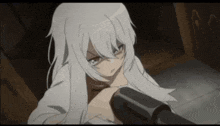 a white haired anime girl is holding a gun