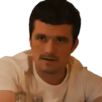 a man with a beard wears a white shirt