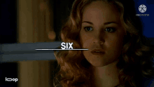 a close up of a woman with the word six above her