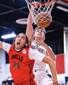 a basketball player wearing a bulls jersey is going for the ball