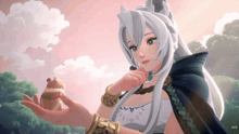 a girl with white hair is holding a small animal in her hand and the letters jxr are on the bottom right