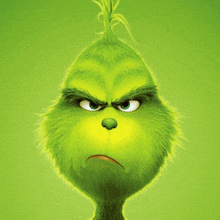 a close up of the grinch 's face with an angry look on his face