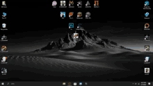 a computer screen with a mountain in the background and a bunch of icons