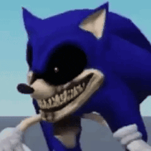a close up of a cartoon character , sonic the hedgehog , with a large smile on his face .