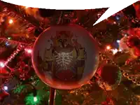 a christmas ornament with a picture of a knight on it hangs from a christmas tree