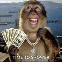 a monkey wearing a necklace and holding a bunch of money with the words time to shower below it