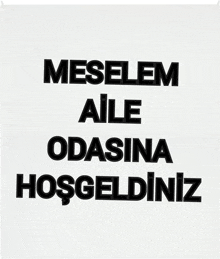 a sign that says " meselem aile odasina hoşgeldiniz " in black letters on a white background