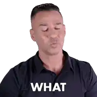 a man in a blue shirt is blowing a kiss and the word what is on the front of his shirt