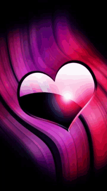 a pink heart is on a purple and black background