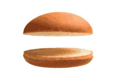 a hamburger bun is cut in half to show the inside and outside