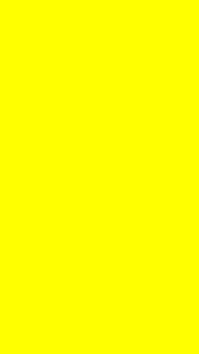 a close up of a bright yellow background with a plain texture .