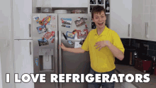 a man in a yellow shirt is standing in front of a refrigerator that says " i love refrigerators "