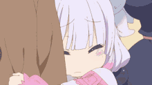 a girl with white hair and a pink dress is hugging someone