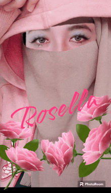 a woman wearing a hijab with the name rosella written on it