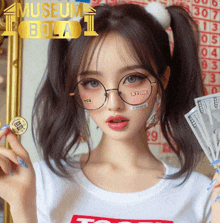 a girl with glasses holds a coin and a bunch of money in front of a museum bola 1 logo