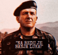 a man in a military uniform has the words " na redu je banja luka " on the bottom