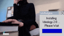a woman sits in front of a computer screen that says win religion installing ideology 2.0 please wait